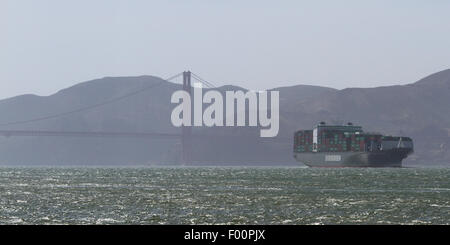 San Francisco, California - May 11 : Shipping barge stacked with containers entering the Bay area, May 11 2015 San Francisco, Ca Stock Photo