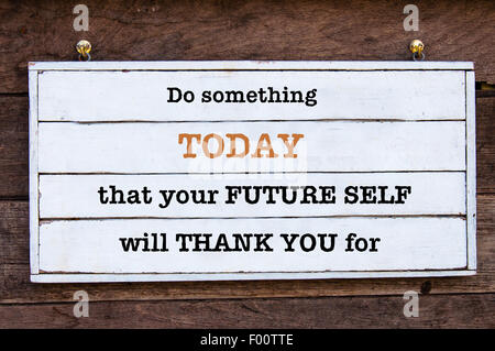 Do Something Today That Your Future Self will Thank You for Inspirational message written on vintage wooden board. Motivational Stock Photo