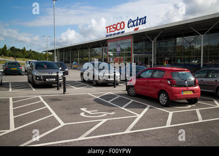 car parking disabled spots at tesco extra superstore at st helens uk Stock Photo