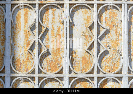 Close up of the ornaments on an old rust metallic portal Stock Photo