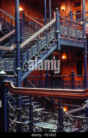 cast iron stairways in atrium of Bradbury Building, Los Angeles, California Stock Photo