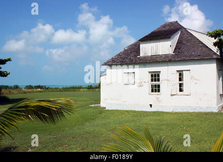 Old abandoned house on the beach Stock Photo