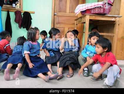Maya indigenous children at preschool built by local NPO in San Antonio Palopo, Solola, Guatemala. Stock Photo