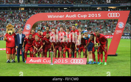 Munich, Germany. 5th Aug, 2015. Bayern Munich's players pose with the trophy after winning the Audi Cup 2015 final between Bayern Munich and Real Madrid in Munich, Germany, on Aug. 5, 2015. Bayern Munich claimed the title with 1-0. Credit:  Philippe Ruiz/Xinhua/Alamy Live News Stock Photo