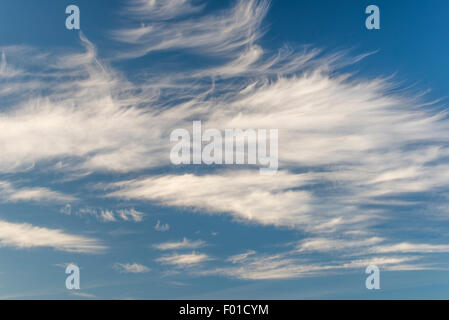 Thin wispy strands of Cirrus Uncinus clouds Stock Photo