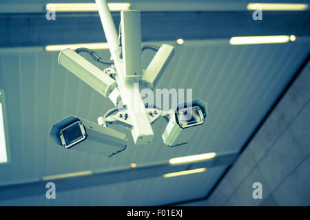 A CCTV camera in a north London station. Stock Photo