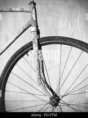 Old rusty bicycle, black and white photo