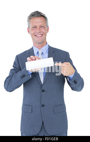 Businessman holding a white sign Stock Photo