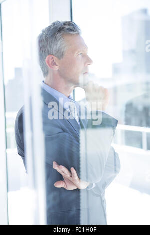 Thinking businessman in the office Stock Photo