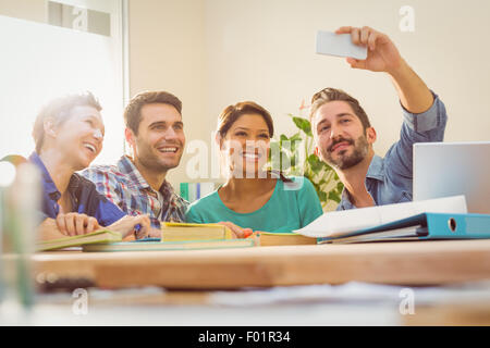 Group of colleagues taking a selfie Stock Photo