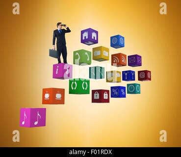Composite image of businessman using binoculars while holding a briefcase Stock Photo