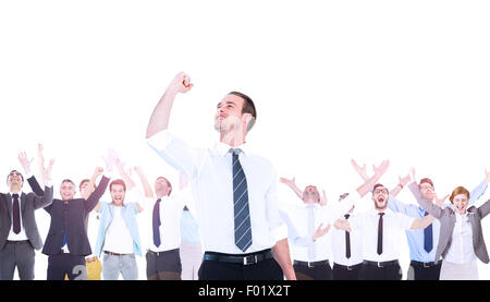 Composite image of businessman cheering with clenched fist Stock Photo