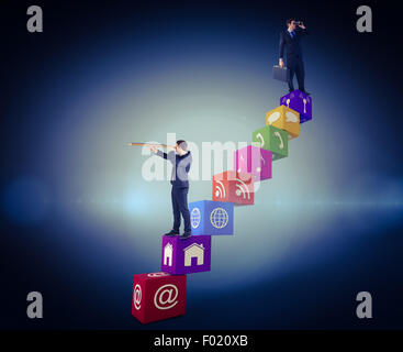 Composite image of businessman using binoculars while holding a briefcase Stock Photo