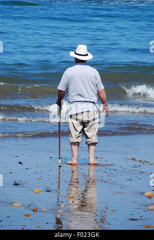 A senior man at the beach gazing out to sea Stock Photo - Alamy