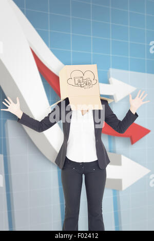 Composite image of businesswoman with box over head Stock Photo