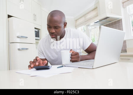 A man working and using his laptop Stock Photo