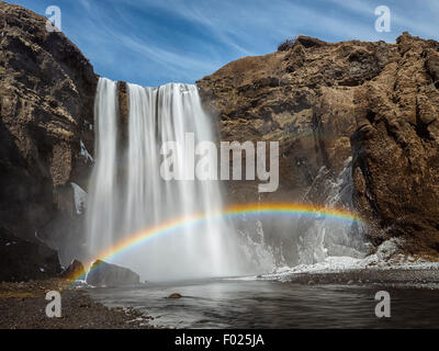 Rainbow over Skogafoss waterfall, iceland Stock Photo