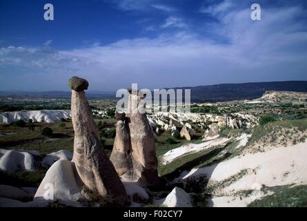 Fairy chimneys (volcanic rock pyramids), near Urgup, Cappadocia, Turkey. Stock Photo