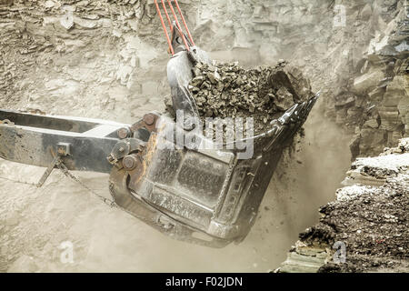 Bucket digger filled with lignite coal Stock Photo