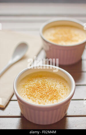 Two Creme Brulee deserts  In Ceramic Bowls Stock Photo