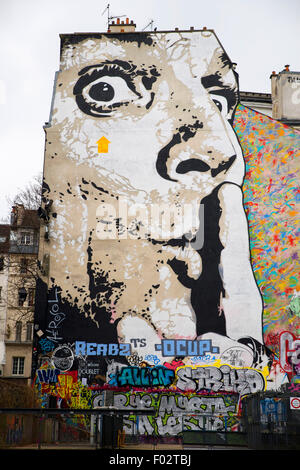 Man Shushing graffiti near the Pompidou centre, Paris Stock Photo
