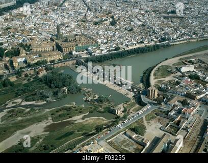 Aerial view of Cordoba, with the Cathedral, former Great Mosque (Mezquita; UNESCO World Heritage List, 1984), the Roman bridge over the Guadalquivir river and the Tower of Calahorra - Andalusia, Spain. Stock Photo