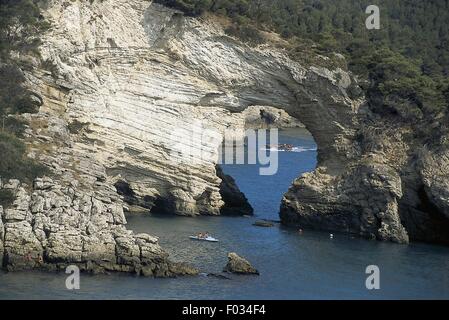 Italy - Apulia Region - Gargano National Park - Cala San Felice and Architiello - Cove and Natural Arch Stock Photo