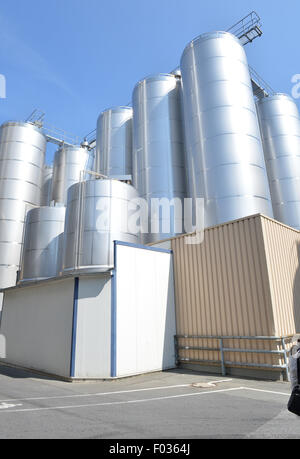 Zeven, Germany. 05th Aug, 2015. Dried milk is stored in these silos at a local branch of German milk company Deutscher Milchkontor (DMK) in Zeven, Germany, 05 August 2015. Photo: Carmen Jaspersen/dpa/Alamy Live News Stock Photo