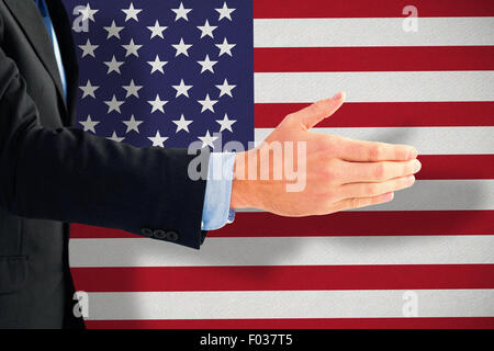 Composite image of businessman ready to shake hand Stock Photo