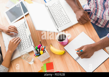 Young business people working at the laptops Stock Photo