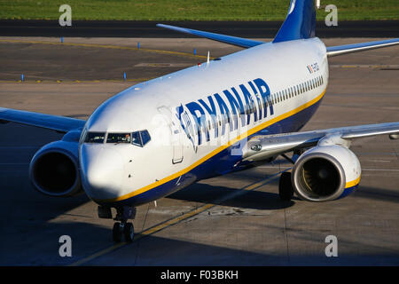 Ryanair Boeing 737-800 taxis to terminal 3 at Manchester airport. Stock Photo