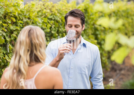 Young happy couple tasting wine Stock Photo