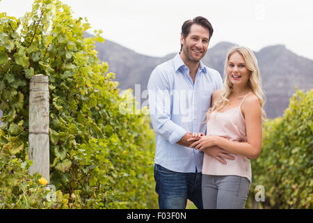 Young happy couple smiling at camera Stock Photo