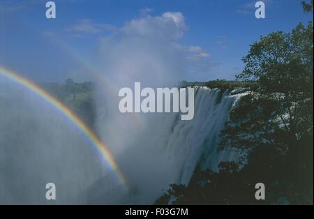 Zimbabwe. Mosi-oa-Tunya 'Victoria Falls' on Zambezi River. UNESCO World Heritage List, 1989. Rainbow. Stock Photo