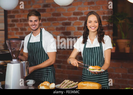 Smiling co-workers working together Stock Photo