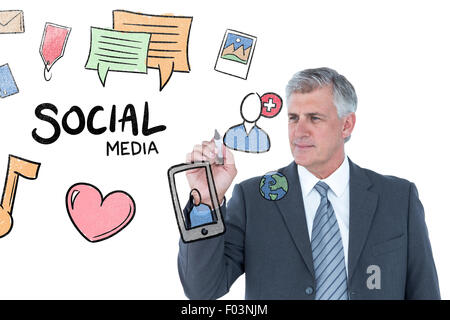 Composite image of businessman writing with black marker Stock Photo