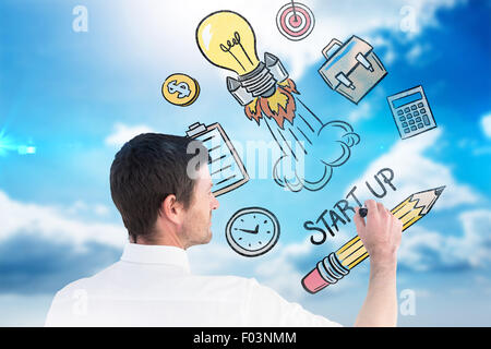 Composite image of business man writing with chalk Stock Photo