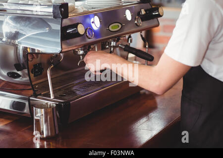 Barista preparing coffee machine Stock Photo