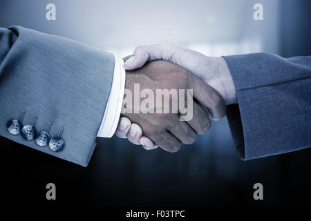 Composite image of side view of business peoples hands shaking Stock Photo
