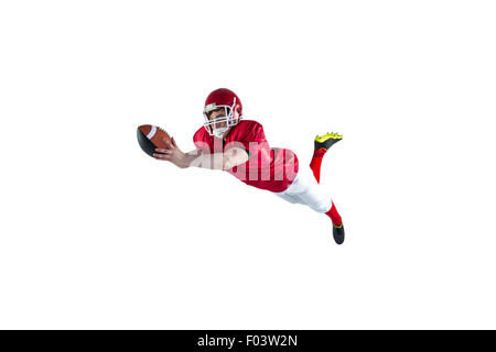 American football player scoring a touchdown Stock Photo