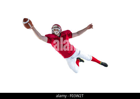 American football player scoring a touchdown Stock Photo