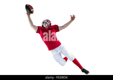 American football player scoring a touchdown Stock Photo