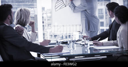 Business people in office at presentation Stock Photo
