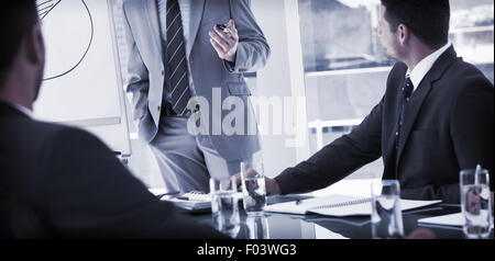 Business people in office at presentation Stock Photo
