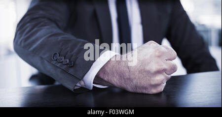 Angry businessman thump the table Stock Photo