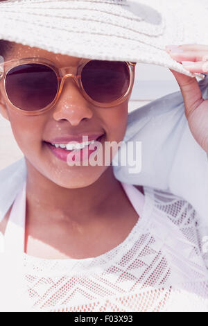 Stylish woman in hat and sunglasses Stock Photo