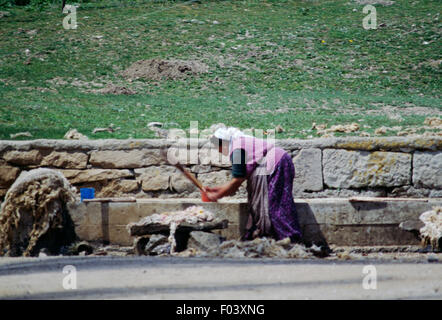 Women washing wool in a tank close to Alacahoyuk, Turkey. Stock Photo