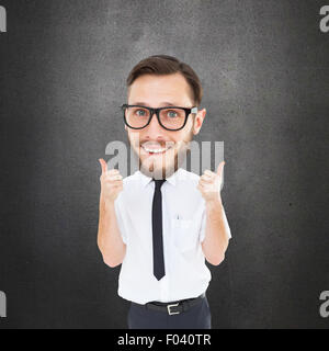 Composite image of geeky businessman with thumbs up Stock Photo