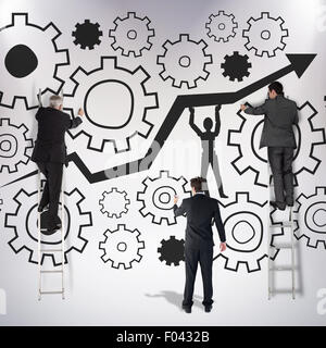 Composite image of business team writing Stock Photo
