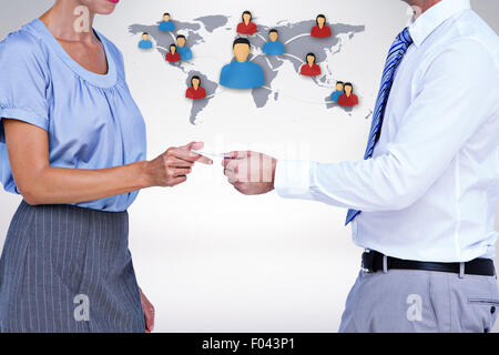 Composite image of business people exchanging business card Stock Photo